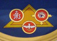 Traditional Christian Iconography combining the Triangle with symbols of the Persons of the Trinity